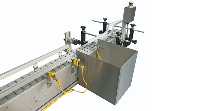 Figure 2.23 - Sensing devices used as part of a product ejection process. Photo courtesy of Accraply