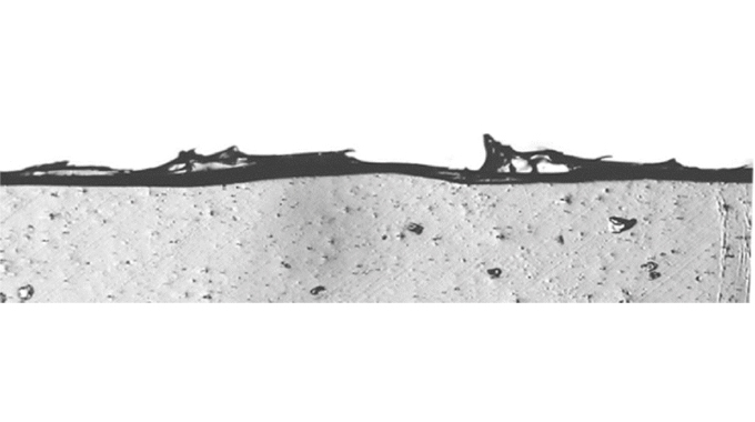 Figure 5.9 Slit PVC shrink film magnified 50x where razor slitting method was used © 2017 Accraply, Inc