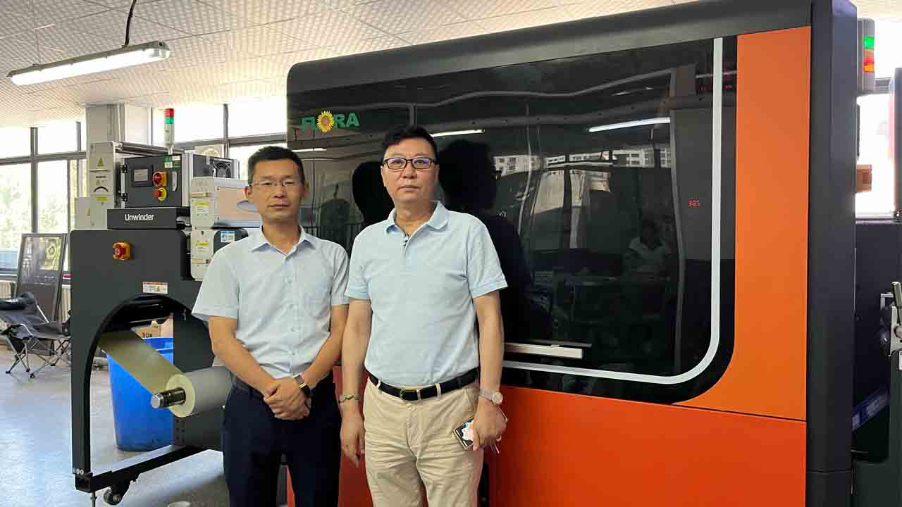 Zhang Peng of Flora and Tian Xuping, founder of Xinma