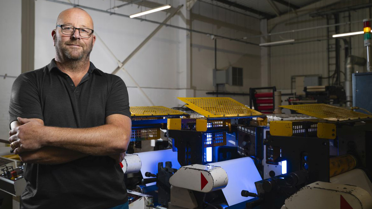 Colin Le Gresley in front of curing machine