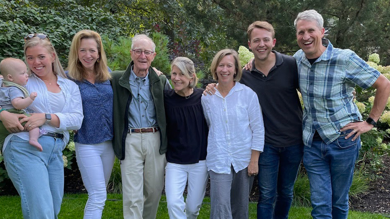 Ginnie Gandy with baby Emmett, Cindy Frost White, Calvin Frost, Debbie Shepherd, Sarah Hoffman, Alex Hoffman and Rich Hoffman all wearing green shoes