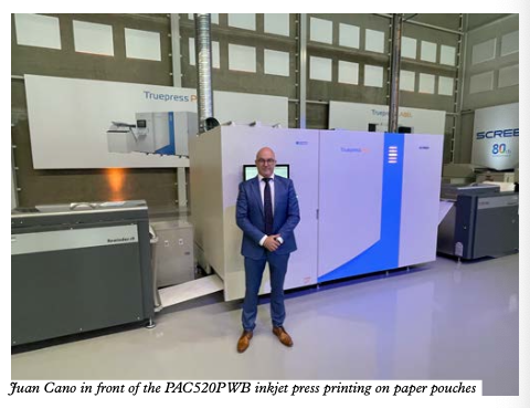 Juan Cano in front of the PAC520PWB inkjet press printing on paper pouches