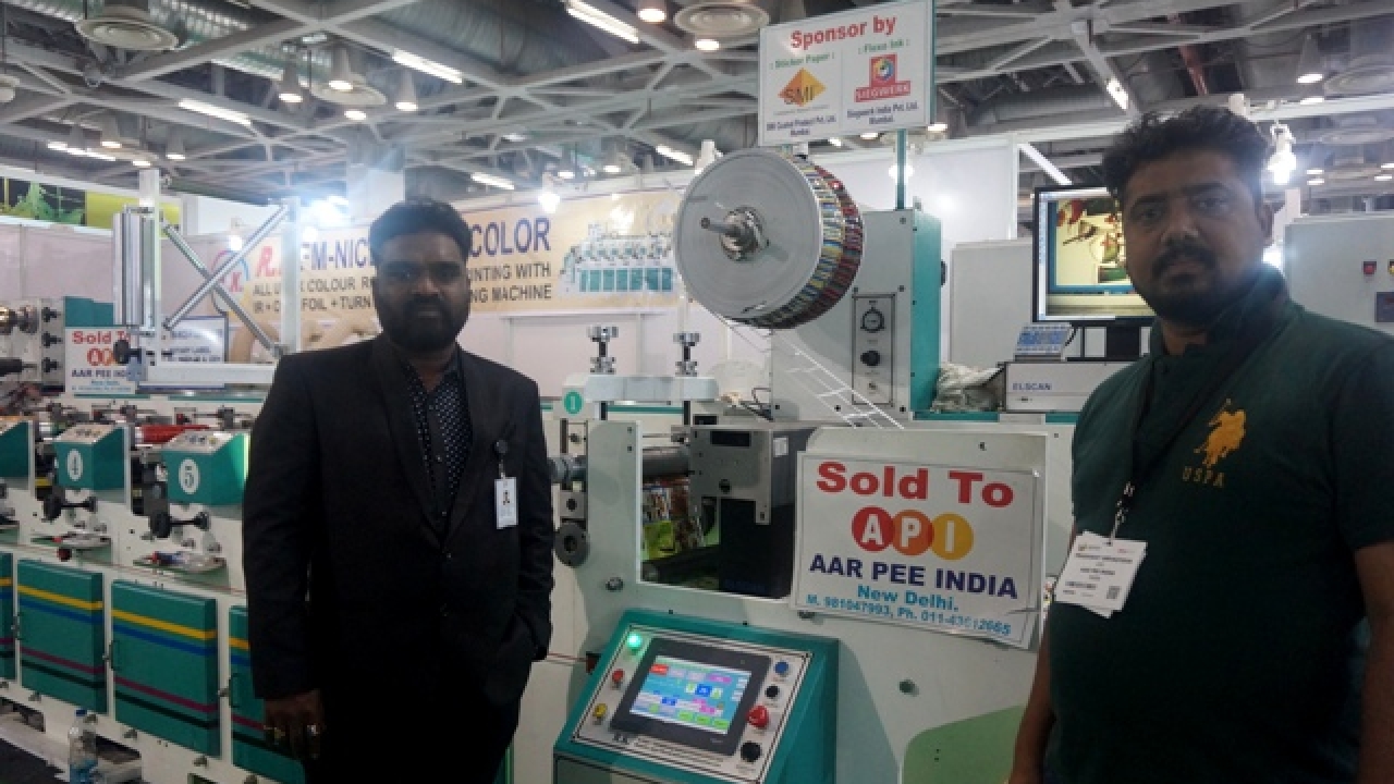 G Naresh, manager at R K Label Printing Machinery with Prashant Srivastava, chief executive officer at Aarpee India during Labelexpo India 2016