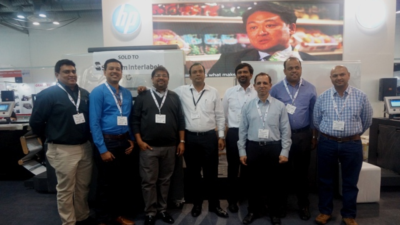 HP Indigo and Skanem Interlabels teams after announcing the deal at Labelexpo India 2016