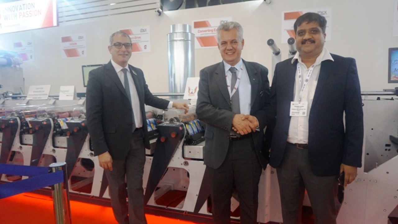 Ashish Shah of Insight Graphics (right) with Paolo Grasso (left) and Marco Calcagni (center) of Omet