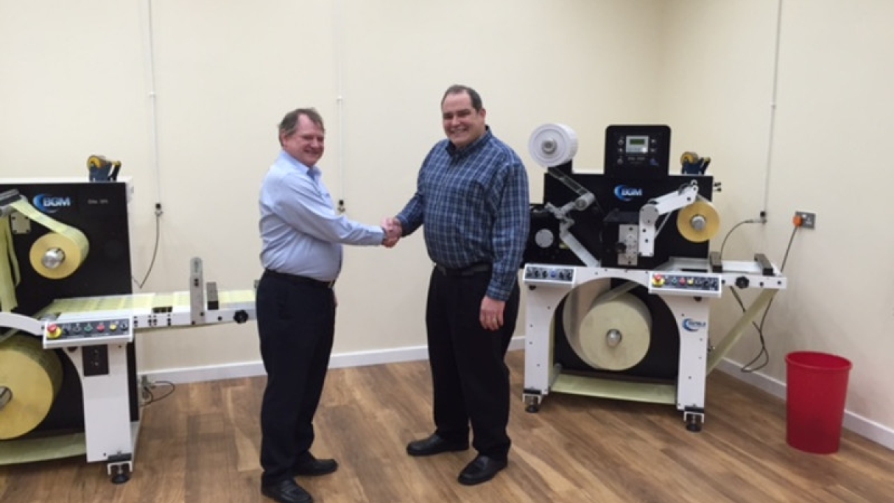 Pictured L-R: Bill Rhodes, chairman of Bar Graphic Machinery, and John Dignam, sales director at J & J Converting