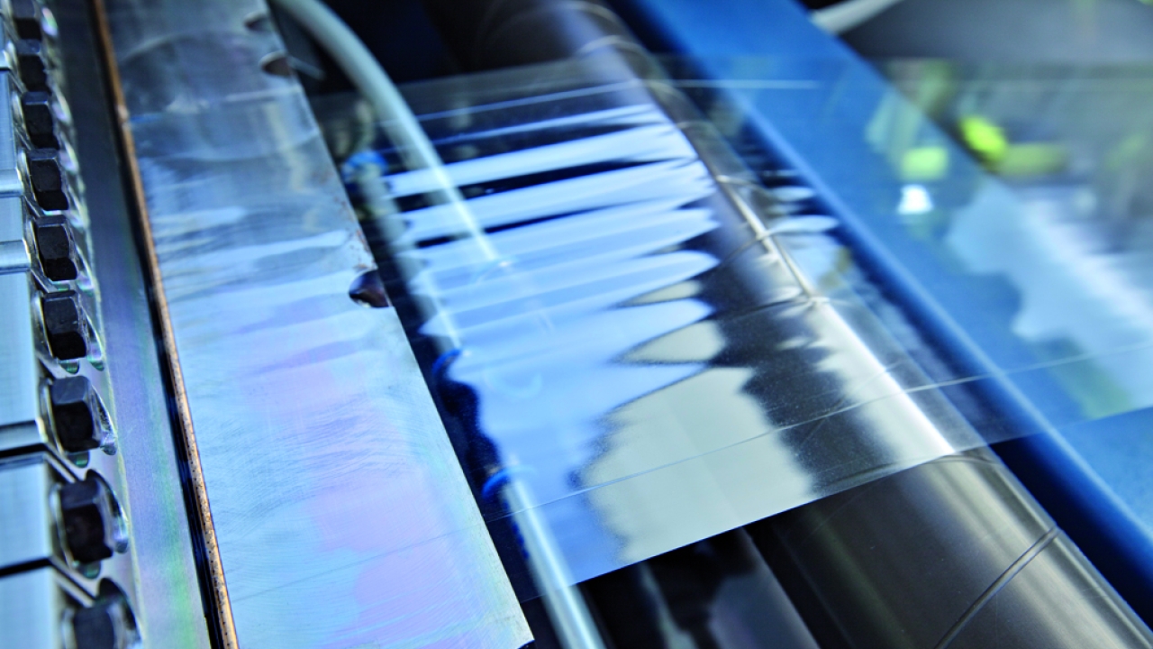 Curtain coating for streak free application on temperature sensitive substrates, such as clear-on-clear labels Curtain coating for streak free application on temperature sensitive substrates, such as clear-on-clear labels