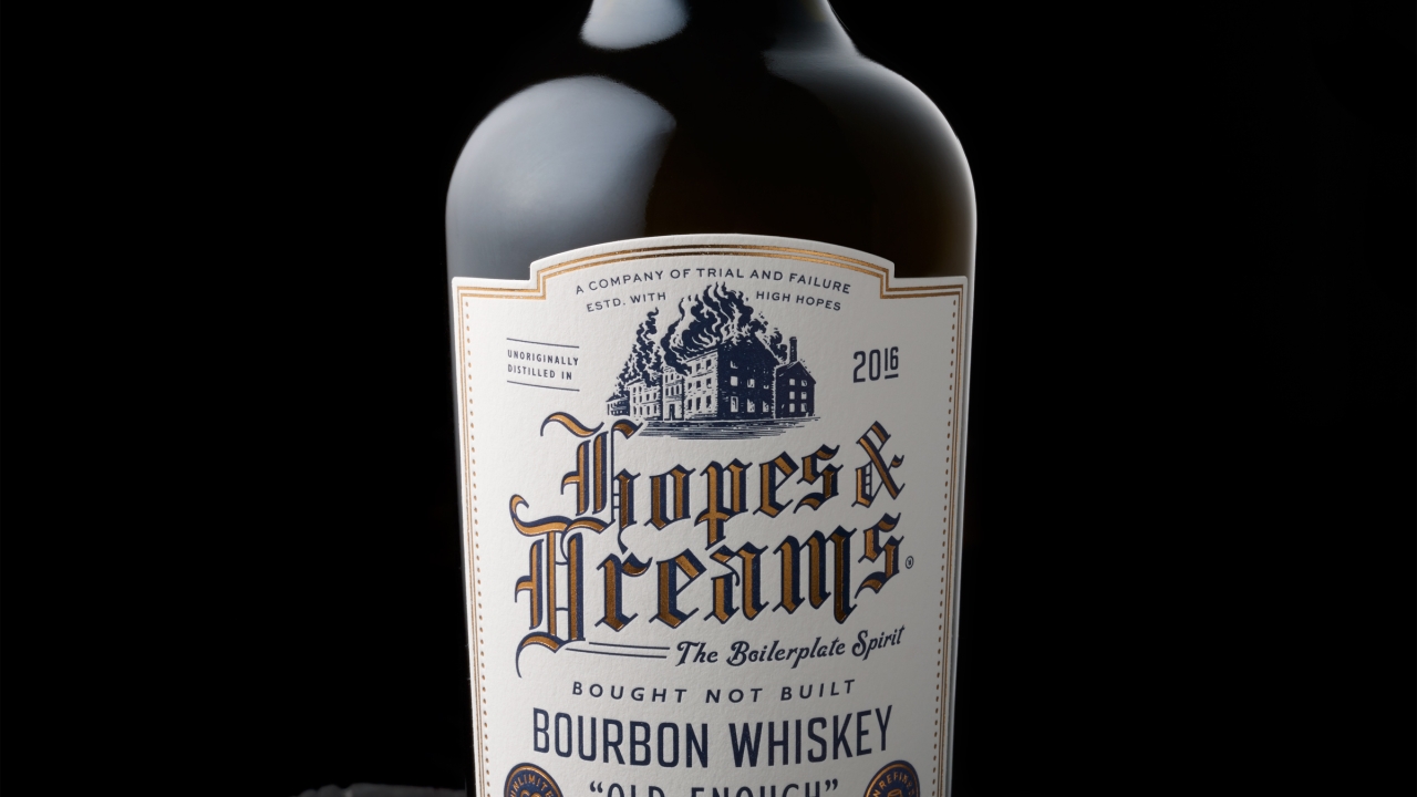 The bottle features a vintage-look, Wild West-style label