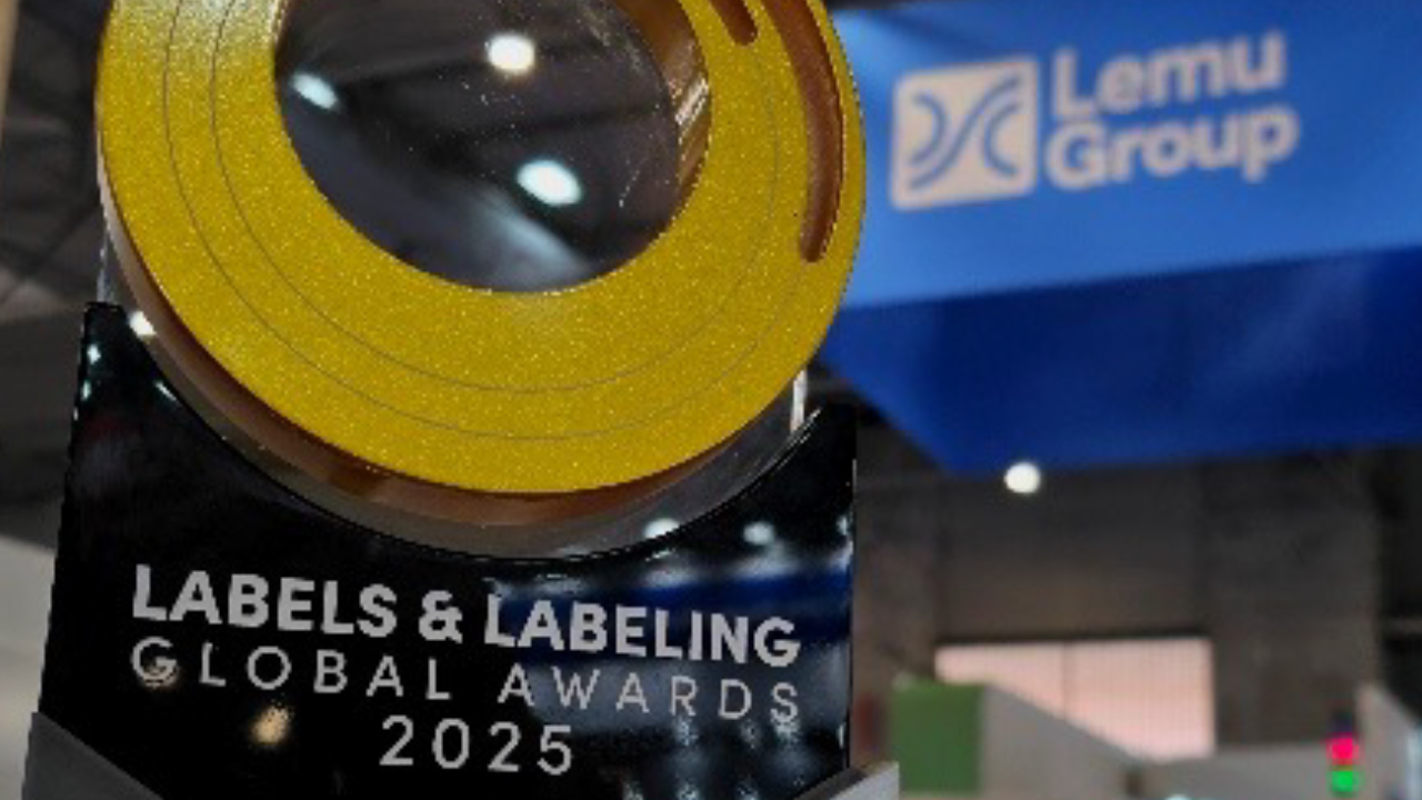 the L&L Global Award trophy in front of a LemuGroup banner