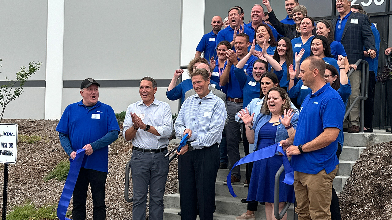 KDV Label CEO Keith Walz cuts the ribbon