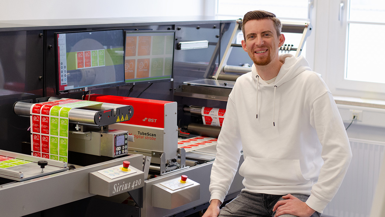 Operator sits beside BST TubeScan on rewinder