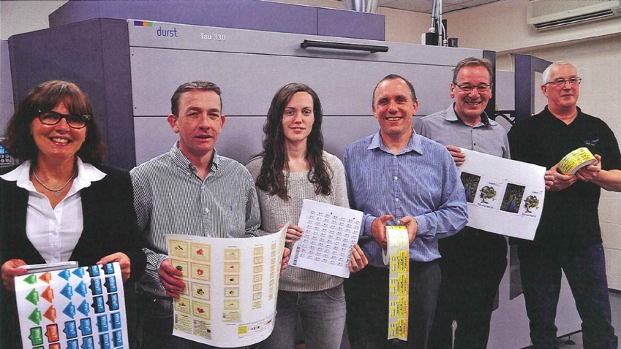 The Label-form team with its Durst Tau 330 HD, including managing director Debbie Mellett (left) and sales director Stewart Serls (third from right) The Label-form team with its Durst Tau 330 HD, including managing director Debbie Mellett (left) and sales director Stewart Serls (third from right)