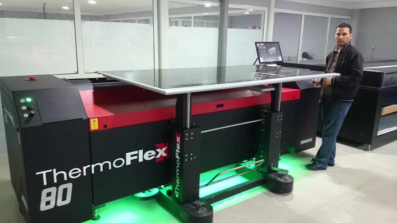 The new ThermoFlexX 80-S imager with Flextray unit at the recently completed Miller Graphics plant in Algeria, with platemaking operator Mounir Salakdji
