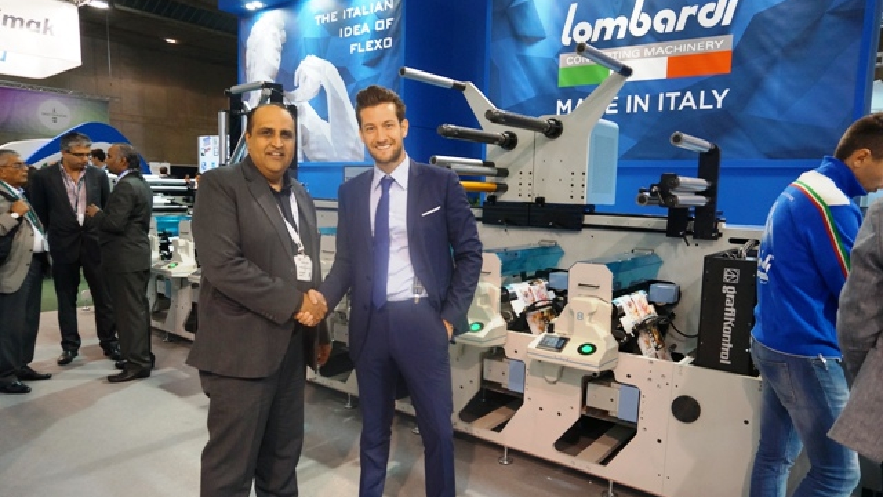 Ranesh Bajaj, director at Vinsak and exclusive agent of Lombardi in India with Nicola Lombardi, marketing manager, Lombardi Converting Machinery at the company's stand during Labelexpo Europe 2015