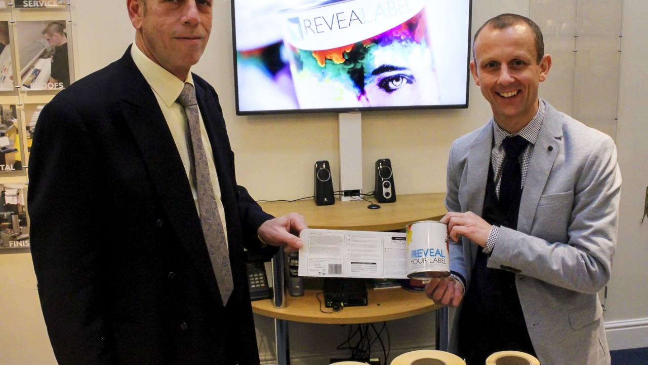 Springfield Solutions joint managing directors Dennis Ebeltoft (left) and Matt Dass demonstrate the company’s new, innovative label Revealabel Springfield Solutions joint managing directors Dennis Ebeltoft (left) and Matt Dass demonstrate the company’s new, innovative label Revealabel