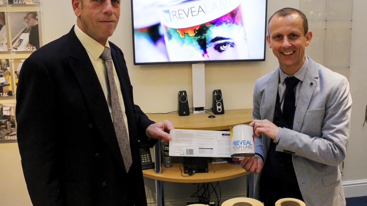 Springfield Solutions joint managing directors Dennis Ebeltoft (left) and Matt Dass demonstrate the company’s new, innovative label Revealabel