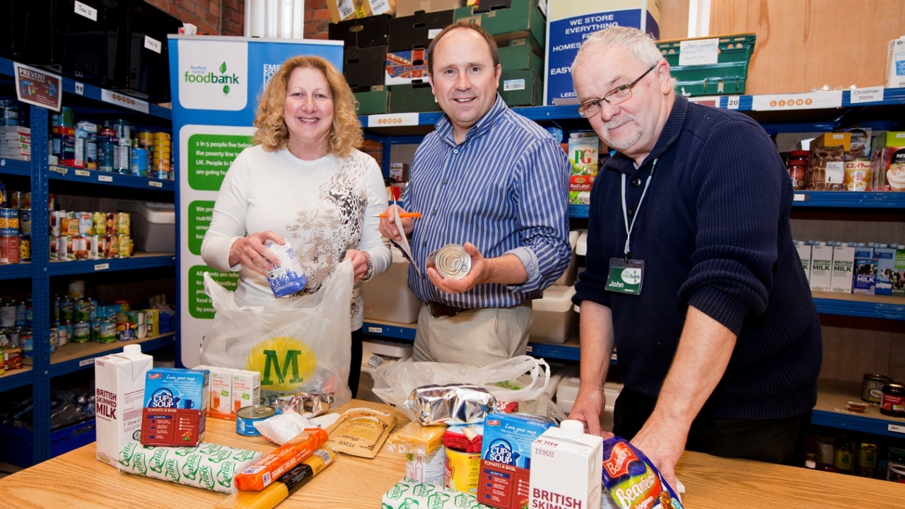 Picture (from left): Watermill Press print director Sandra Carr, Watertmill Press managing director Dale Deacon and Bradford Central Foodbank volunteer John Hustwick