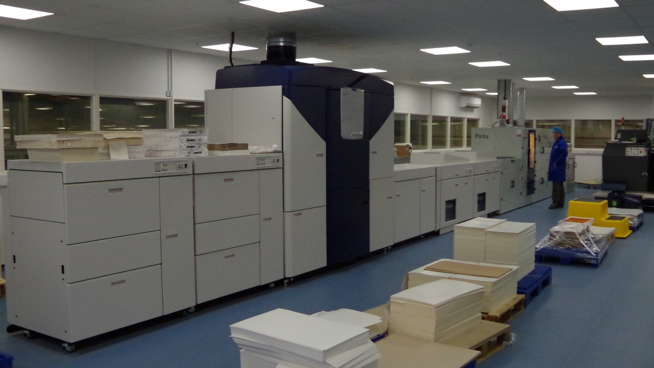 The workflow features a Xerox iGen 4 sheet-fed digital press with a Tresu Pinta coater integrated in-line and, near-line, a Kama ProFold 74 folder gluer and Kongsberg plotter The workflow features a Xerox iGen 4 sheet-fed digital press with a Tresu Pinta coater integrated in-line and, near-line, a Kama ProFold 74 folder gluer and Kongsberg plotter
