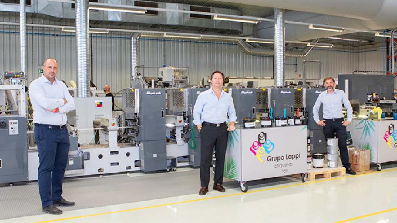 L-R: Javier Rodríguez, technical director, Miyakoshi Europe; Antonio Lappí, president and CEO of Grupo Lappí; and David López, Miyakoshi Europe sales area manager, in front of the Spanish converter’s Miyakoshi MLP semi-rotary offset press