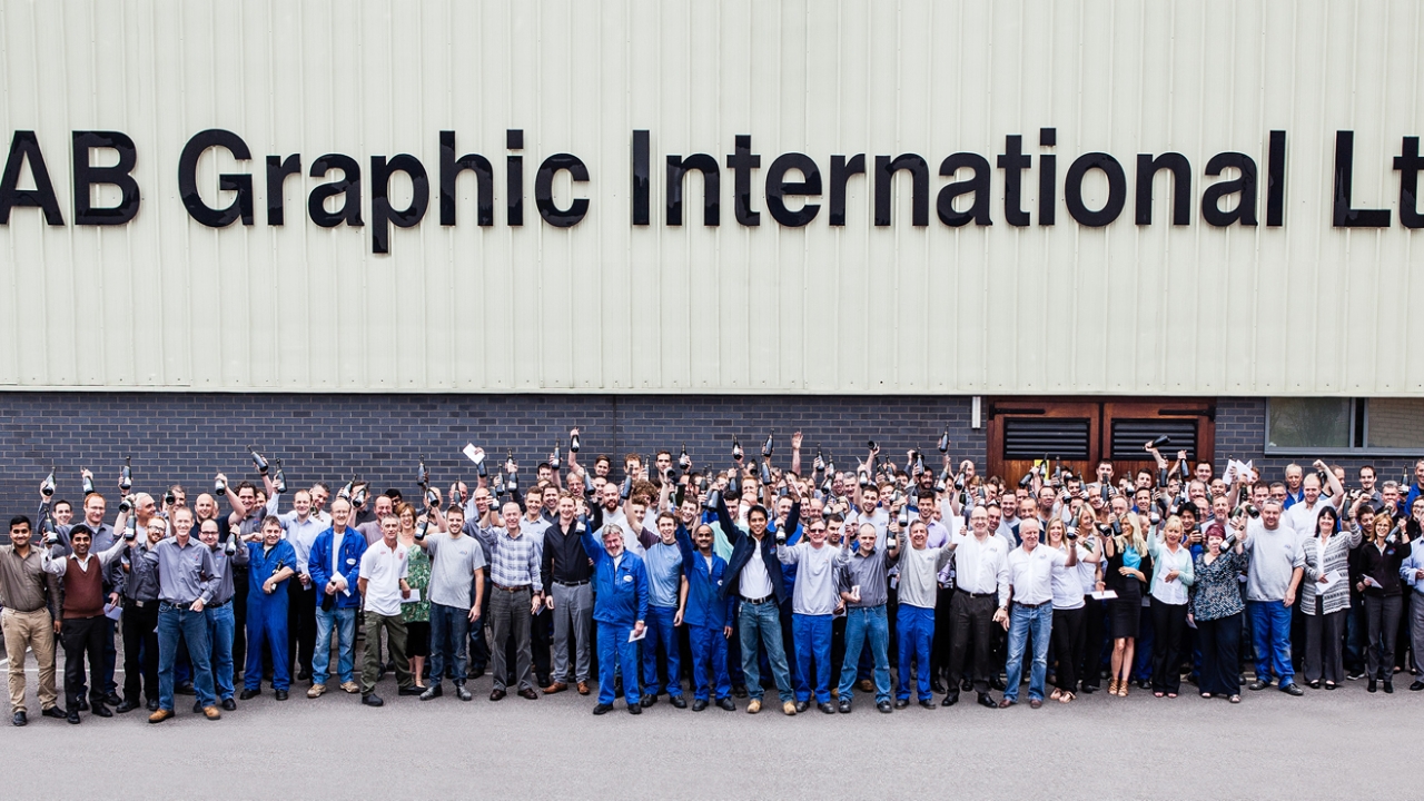 AB Graphic is celebrating 60 years in business, with every member of the company’s worldwide team presented with a bottle of champagne labeled with a commemorative, digitally printed design that was finished on one of its Omega Digicon systems