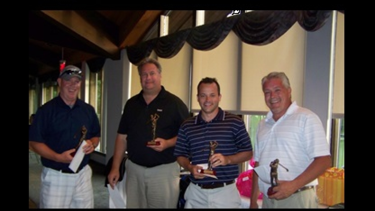 Pictured (from left): Tournament winners Pat McGowan from UPM Raflatac, Steve Molinets from Tesa Tape, Rob Quast from UPM Raflatac and Ken Paveza from A-Flex Label 