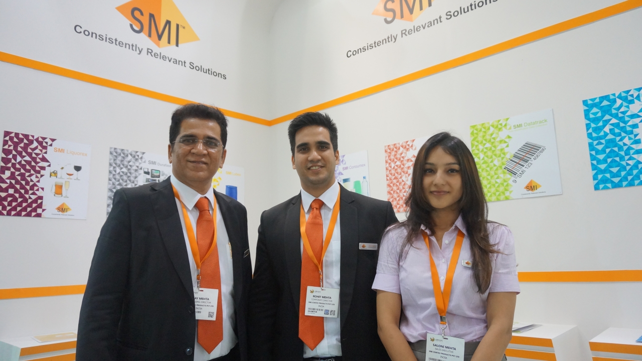 SMI director Ajay Mehta, Rohit Mehta and Saloni Mehta at the SMI Coated Products stand at Labelexpo India