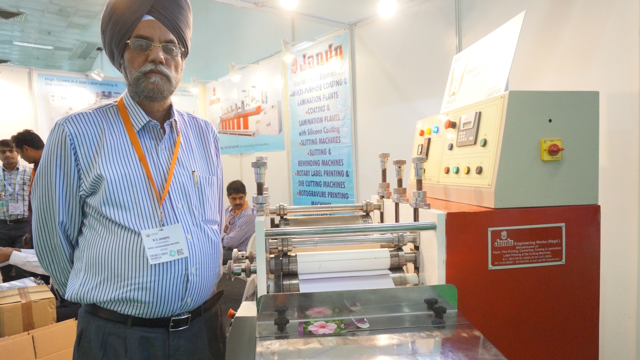 B S Jandu, CEO, Jandu Engineering at Labelexpo India with the slitting and sheeting machine sold to Weldon Celloplast