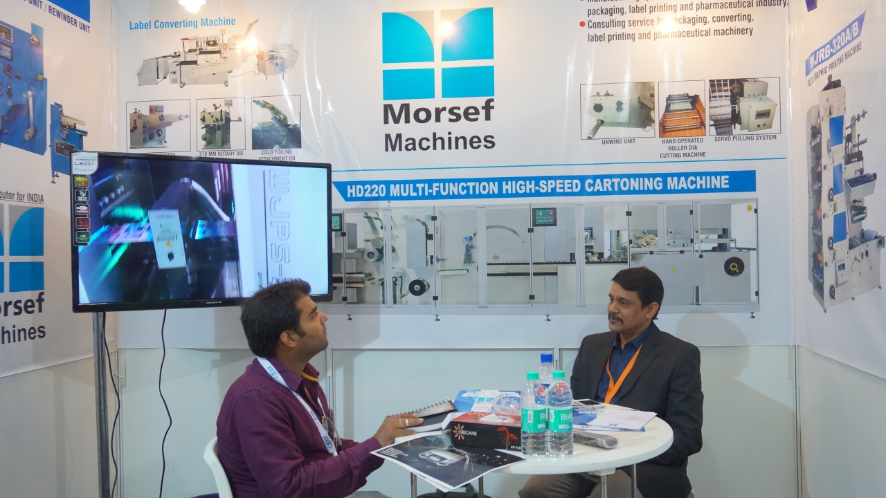 Humayun Ahmed, partner at Morsef Machines in discussion with a customer at Labelexpo India