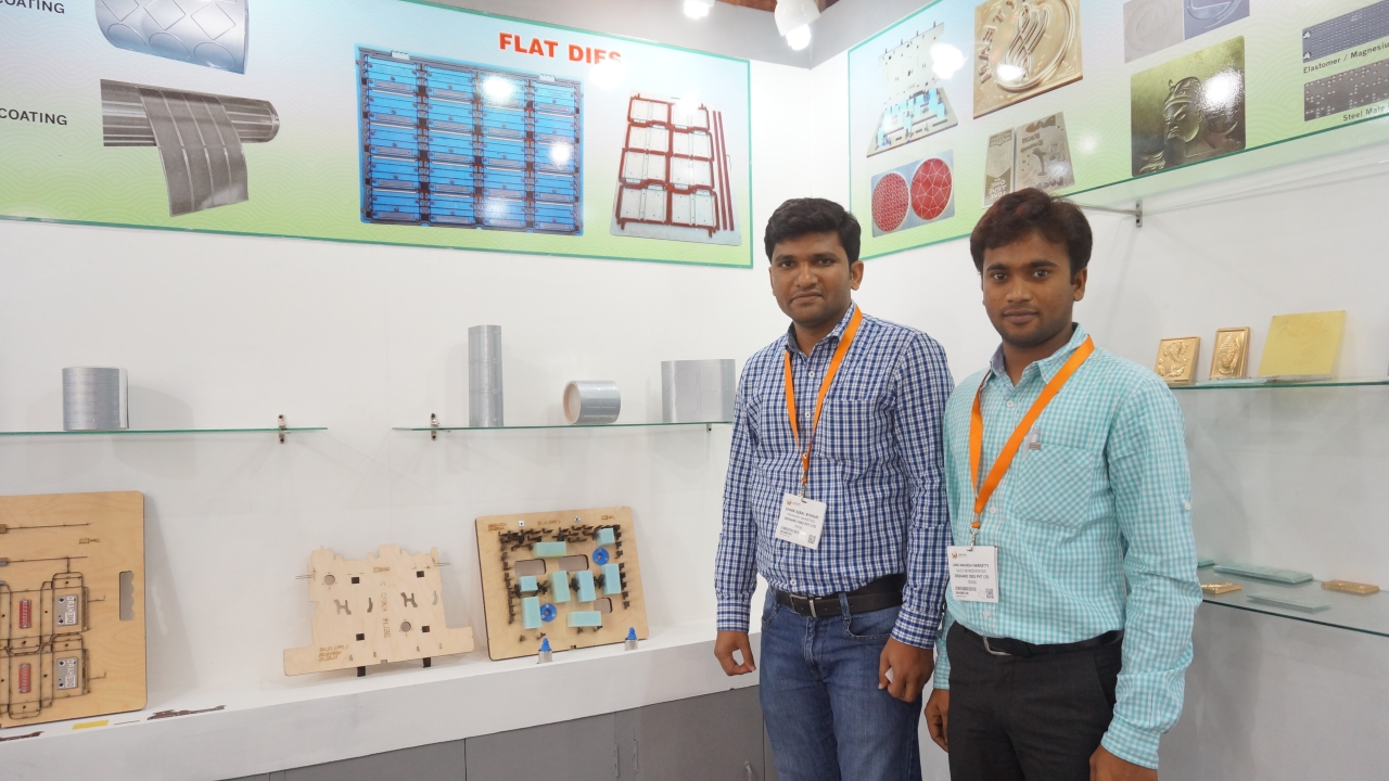 Iqbal Bhagat on the left with his colleague at their stand during Labelexpo India 2014