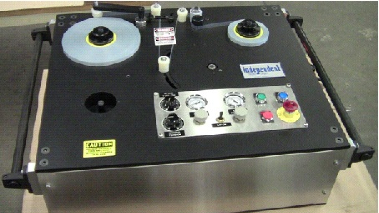 Tape Deck Roll Doctor Rewind for rewinding narrow width defective or imperfect rolls into acceptable pancake rolls