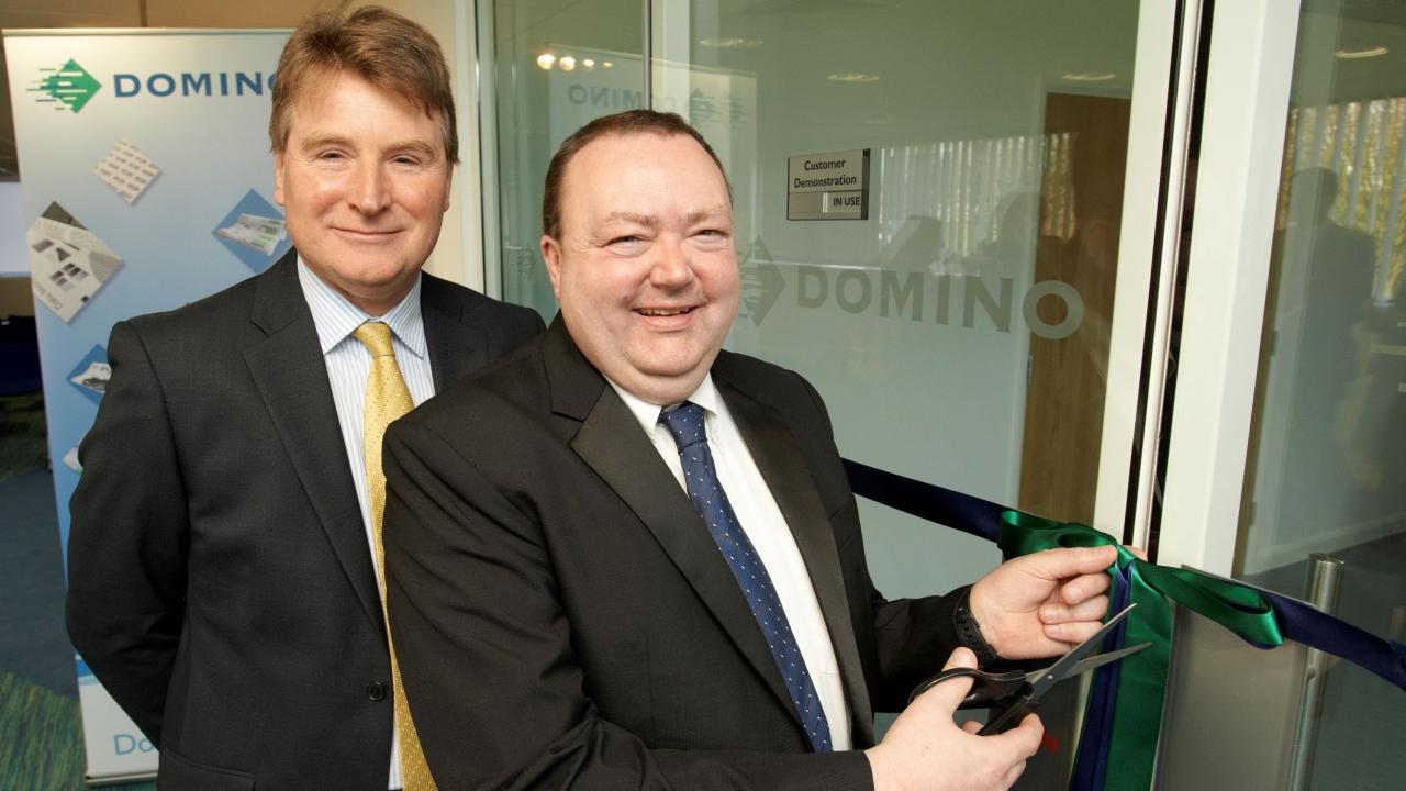 Domino Printing Sciences’ Group Managing Director Nigel Bond (left) and Barry Few, Worldwide Technical Training Manager Digital Printing Division, officially open the company’s new digital printing demonstration centre