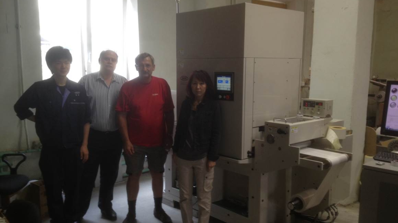 (L-R) Shiki press operator; Sergei Mezentcev, general director of Ogma; Boris Gin, director of Wiborg Inform; Yoko Yamasaki, Shiki. (L-R) Shiki press operator; Sergei Mezentcev, general director of Ogma; Boris Gin, director of Wiborg Inform; Yoko Yamasaki, Shiki.