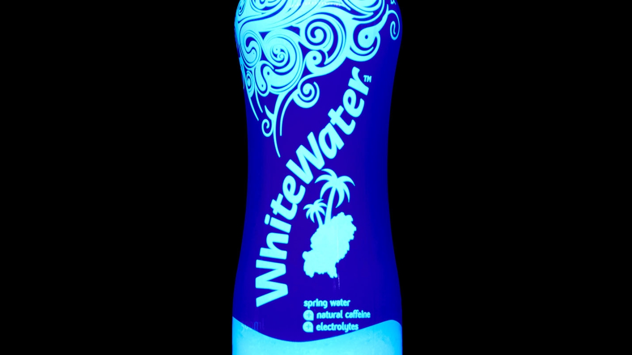 In darkness and in particular, exposure to UV light, the pack is transformed, glowing electric blue