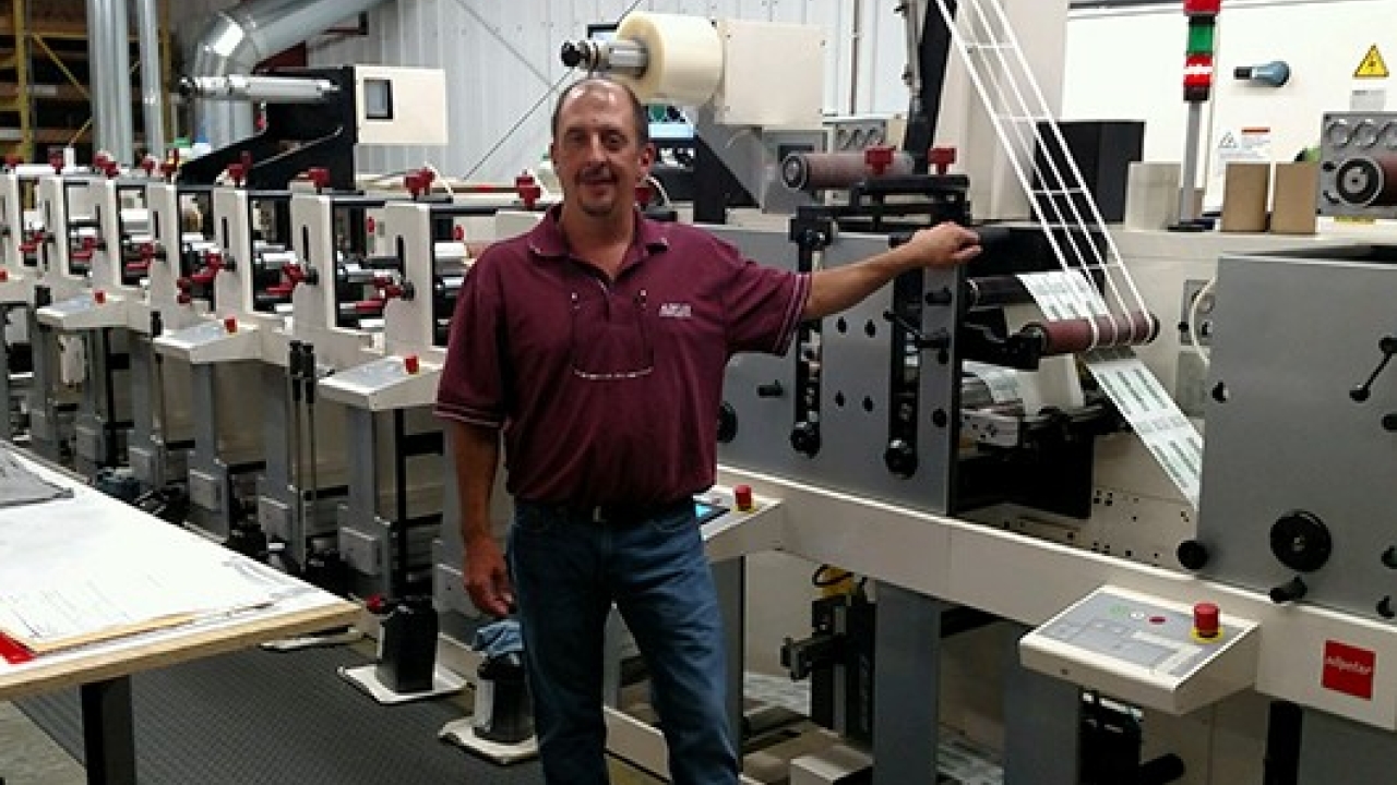 Adflex Corporation president Jeff Andolora alongside the company’s new 8-color Nilpeter FB servo-driven flexo press Adflex Corporation president Jeff Andolora alongside the company’s new 8-color Nilpeter FB servo-driven flexo press