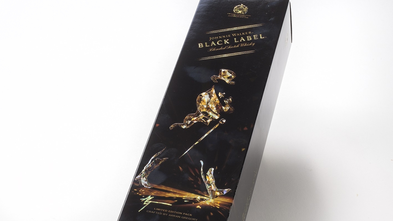 This limited edition pack for Johnnie Walker employs a holographic substrate with a broken glass pattern coupled with 3D embossing