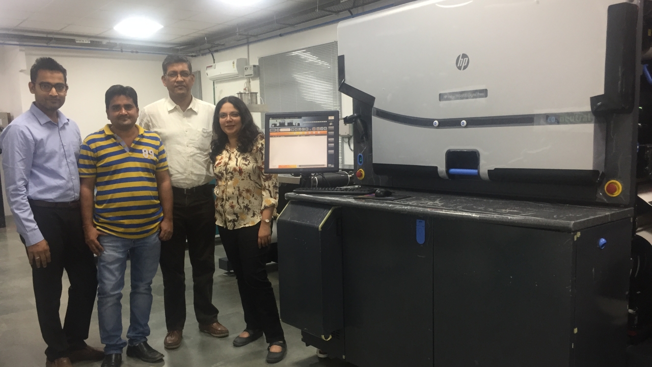 Directors Vikram Prasad and Honey Vazirani with their team and the new HP Indigo WS6800 press