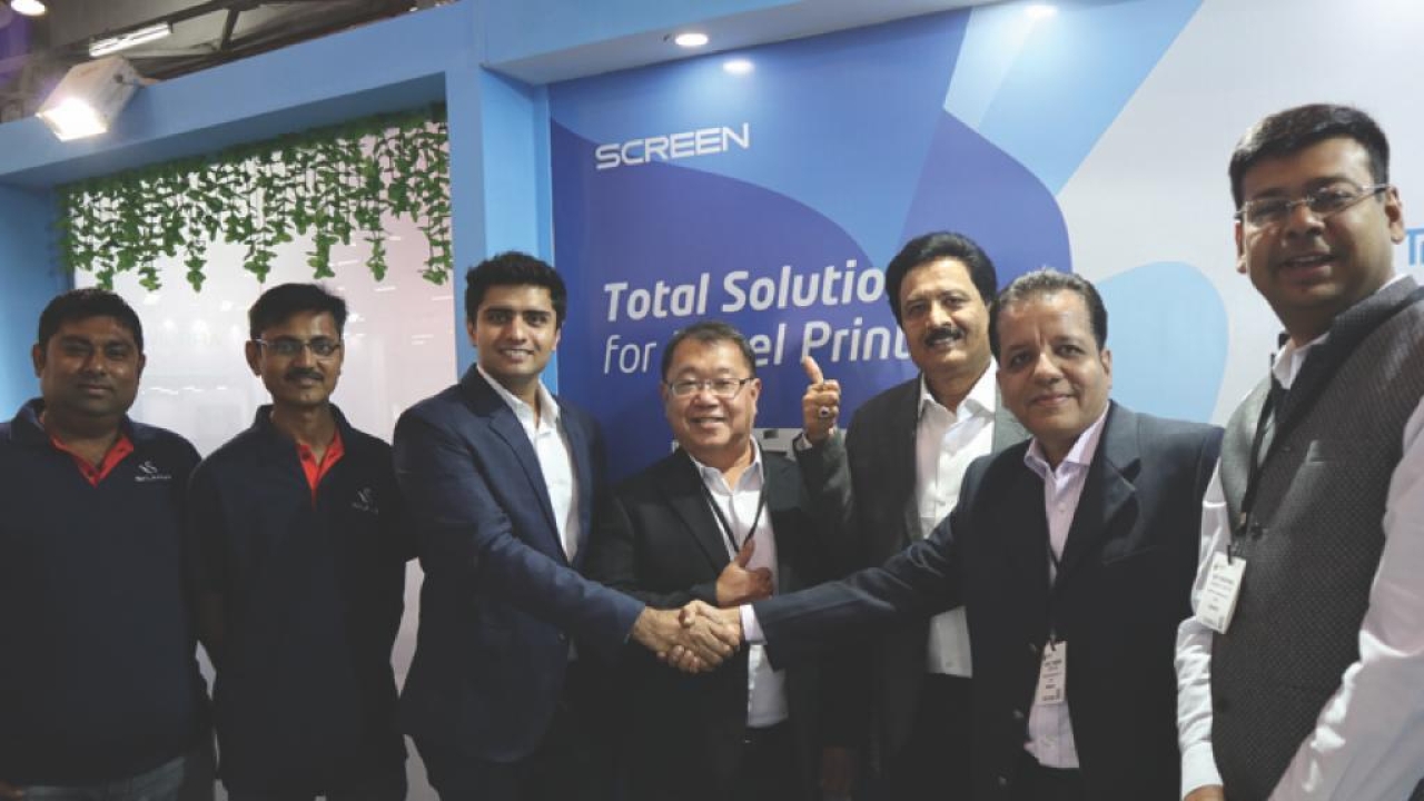 S.Kumar and Insight Communications teams after signing the deal for the first Screen digital press at Labelexpo India 2018