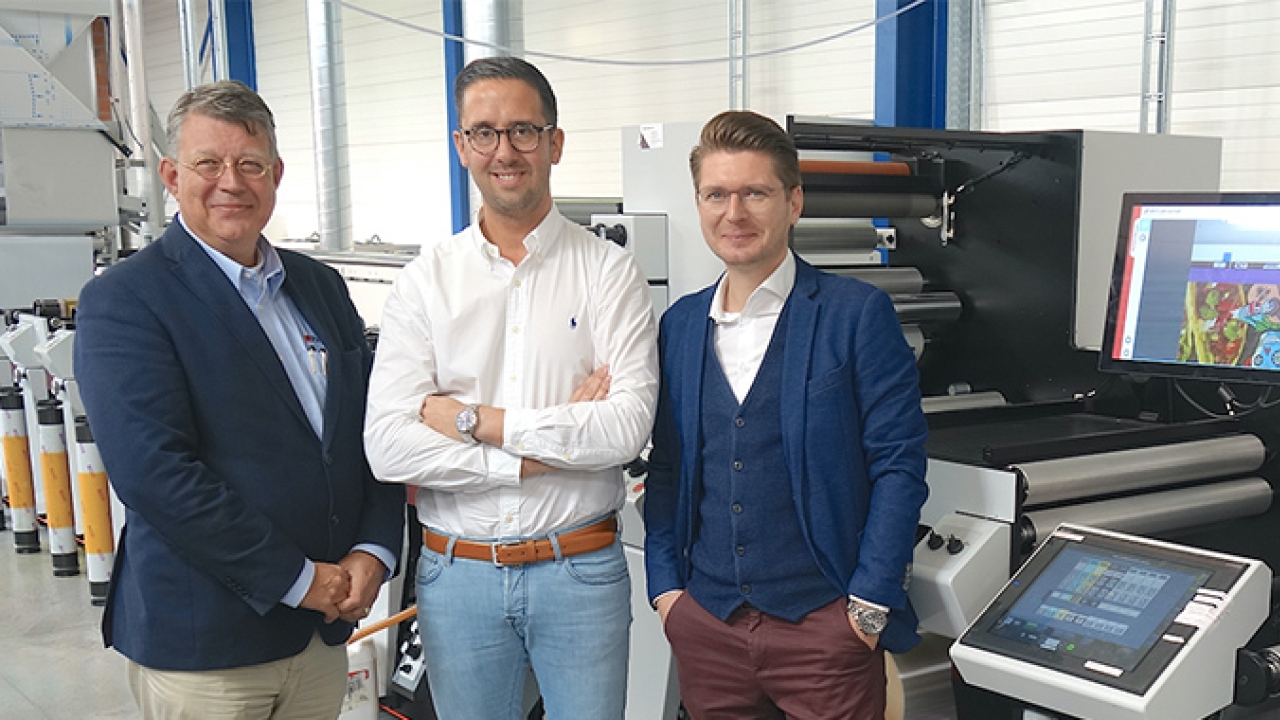 L-R: Maarten van Bergeijk, Packtion; Michaёl Thorrez and Timo Donati of Flexprinter with new Mark Andy P7E flexo line