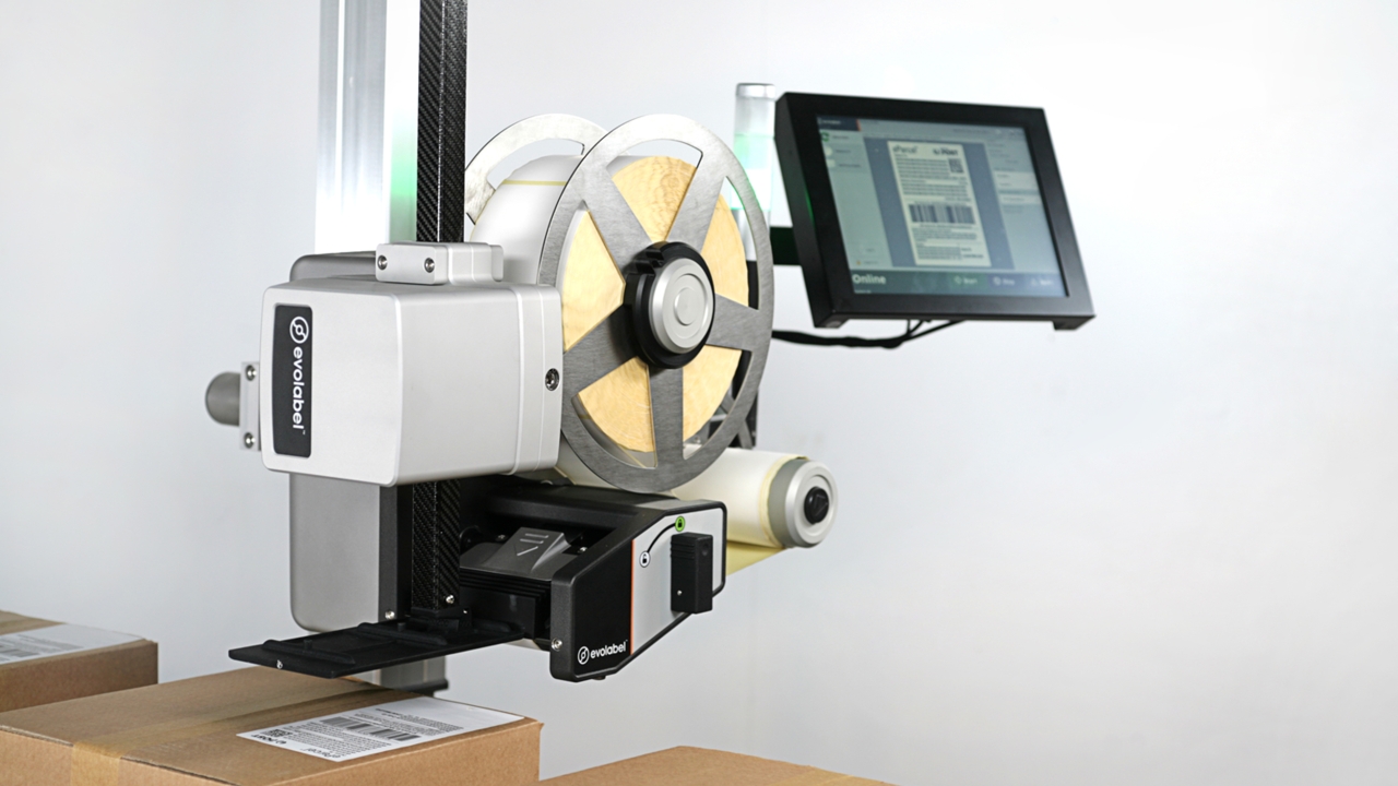 Quicktamp Logistics Labelling System, exclusively available in the UK from ILS, is a fast and flexible applicator developed by Evolabel Quicktamp Logistics Labelling System, exclusively available in the UK from ILS, is a fast and flexible applicator developed by Evolabel