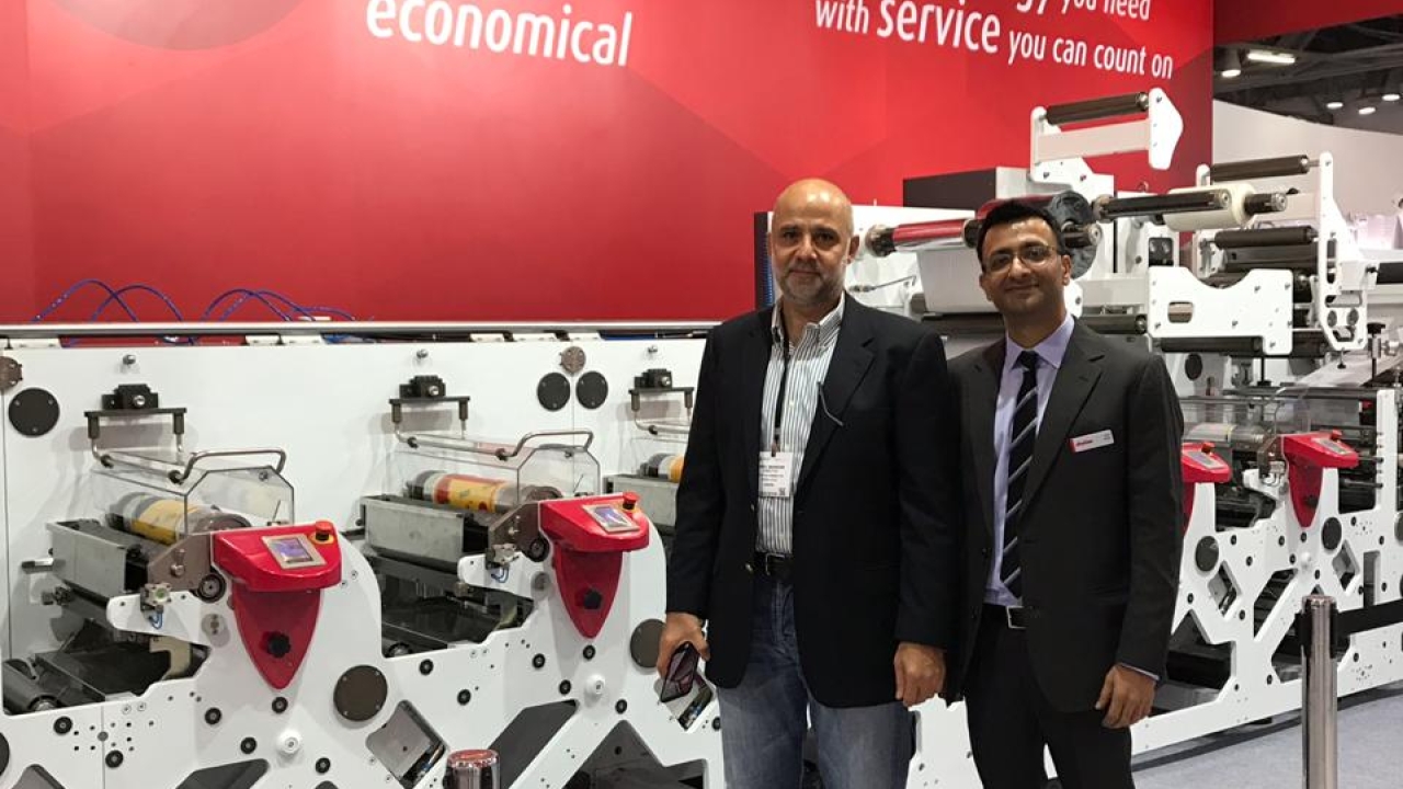 L to R- Nabil of Westflex with Amit Ahuja of Multitec in front of S1 press at Labelexpo India 2018