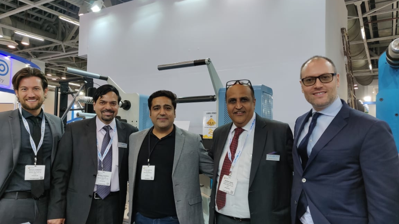 Vishal Pasricha, owner of Polylam Printers (center) with Lombardi and Vinsak teams at Labelexpo India 2018