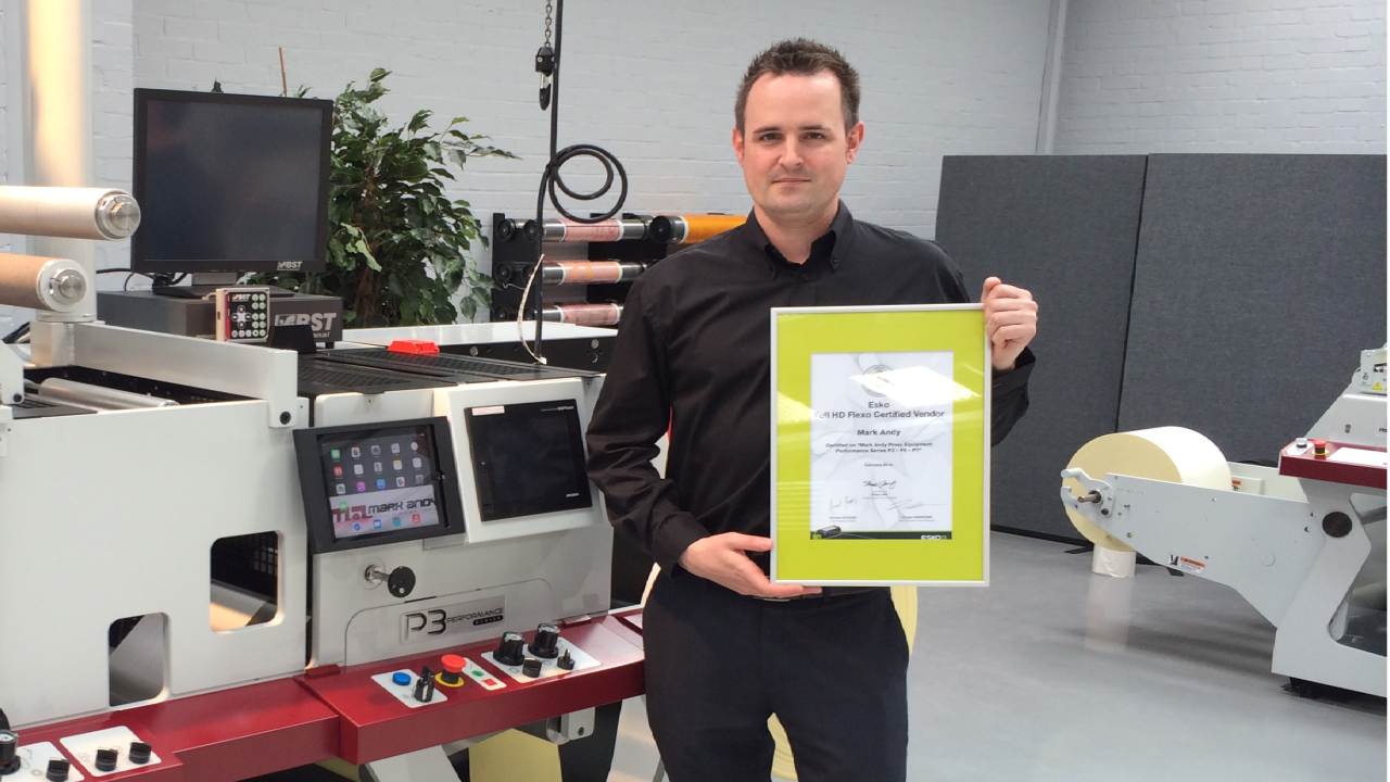 Phil Baldwin, Mark Andy's aftermarket manager for Europe, with the Esko Full HD certificate Phil Baldwin, Mark Andy's aftermarket manager for Europe, with the Esko Full HD certificate