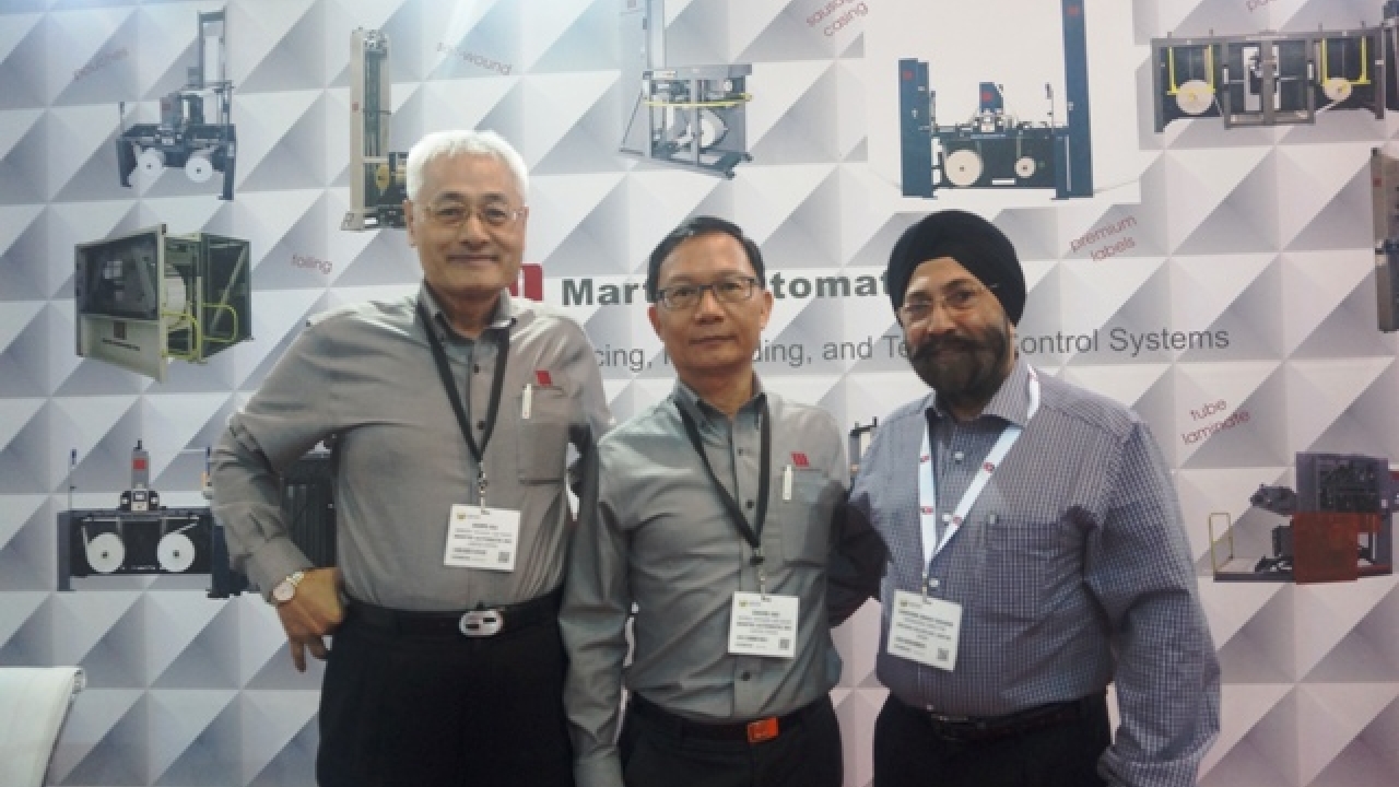 Hope Hu and David Ho of Martin Automatic with Harveer Sahni of Weldon Celloplast at Labelexpo India 2016 Hope Hu and David Ho of Martin Automatic with Harveer Sahni of Weldon Celloplast at Labelexpo India 2016