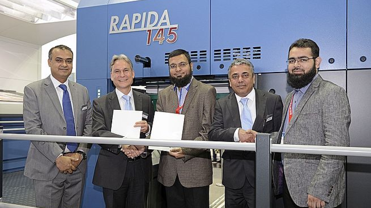 Artotec’s management with representatives from KBA and sales partner Imprint in front of the Rapida 145 