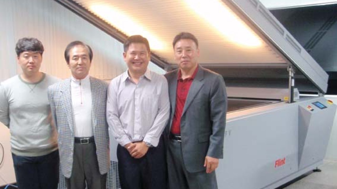 From left to right: Jihoon Chung, director of Kyoung Wha; Sungkon Chung, president, Kyoung Wha; Supachai Theravithayangkura, senior technical manager, Flint Group Thailand; and Jong Seo Lee, president at Korea Printcore with the new nyloflex NExT Exposure at Kyoung Wha