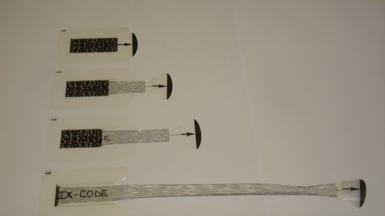The patented IXcode label is designed to replace scratch-off pin code protection systems, which use silver inks over the printed pin number which the customer needs to scratch off to display the pin
