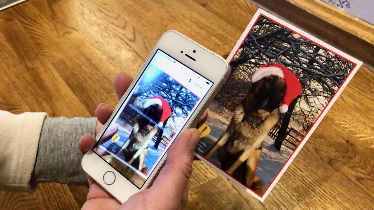 Use the Linkz app to scan this image and Holly the shepherd dog to see what she did in previous years Linkz demonstrates technology with connected Christmas card