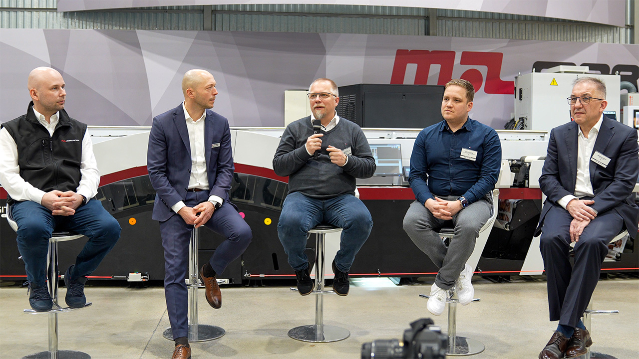 Lukasz Kaczynski, Lukasz Chruslinski, Nils Otto, Sam Coussens and Mariusz Geras sitting on stools