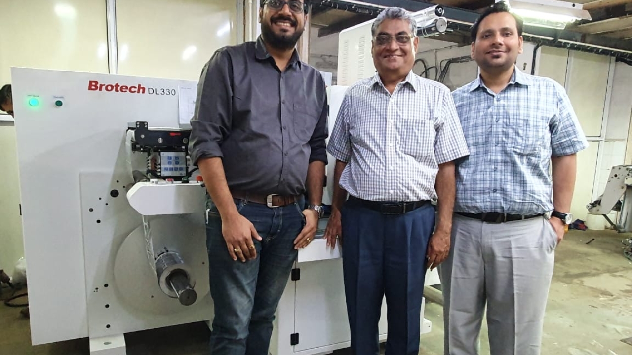 L to R: Kapil Vaidya, SP Ojha, Aditya Ojha in front of the new Brotech at Sonic Labels L to R: Kapil Vaidya, SP Ojha, Aditya Ojha in front of the new Brotech at Sonic Labels