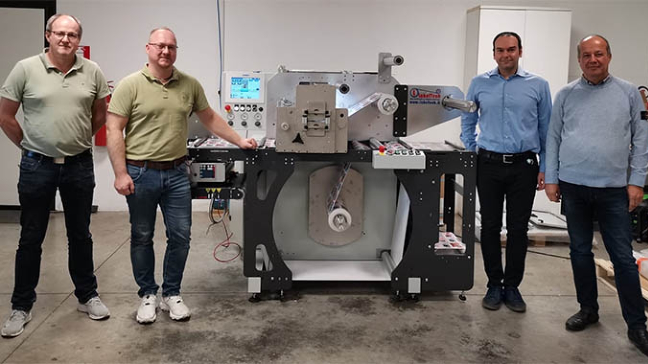(L-R) Jens Mayer, Thorsten Fuest, Gabriele D’Onofrio, Reinhart Dortschy with Labeltech Ortles slitter (L-R) Jens Mayer, Thorsten Fuest, Gabriele D’Onofrio, Reinhart Dortschy with Labeltech Ortles slitter